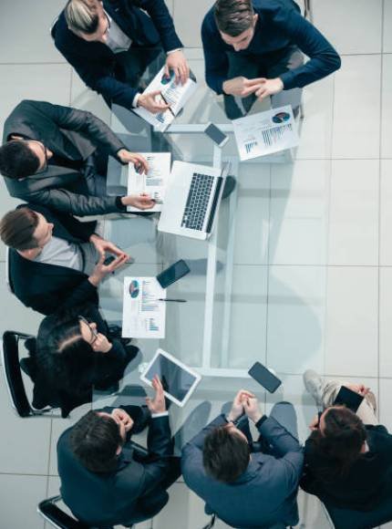 top view. business team discussing financial data. business concept. top view. business team discussing financial data. business concept.