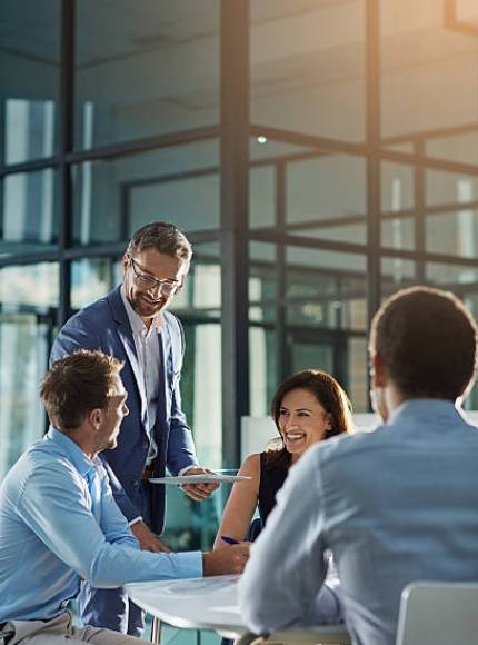 Shot of businesspeople having an office meeting Shot of businesspeople having an office meeting