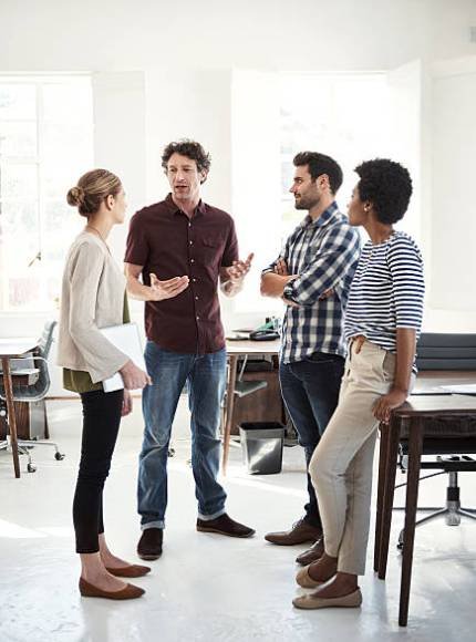 Shot of a team of designers working together in an office Shot of a team of designers working together in an office